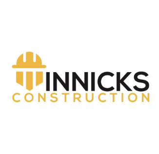 Logo of Minnicks Construction featuring a yellow hard hat symbol and bold text.